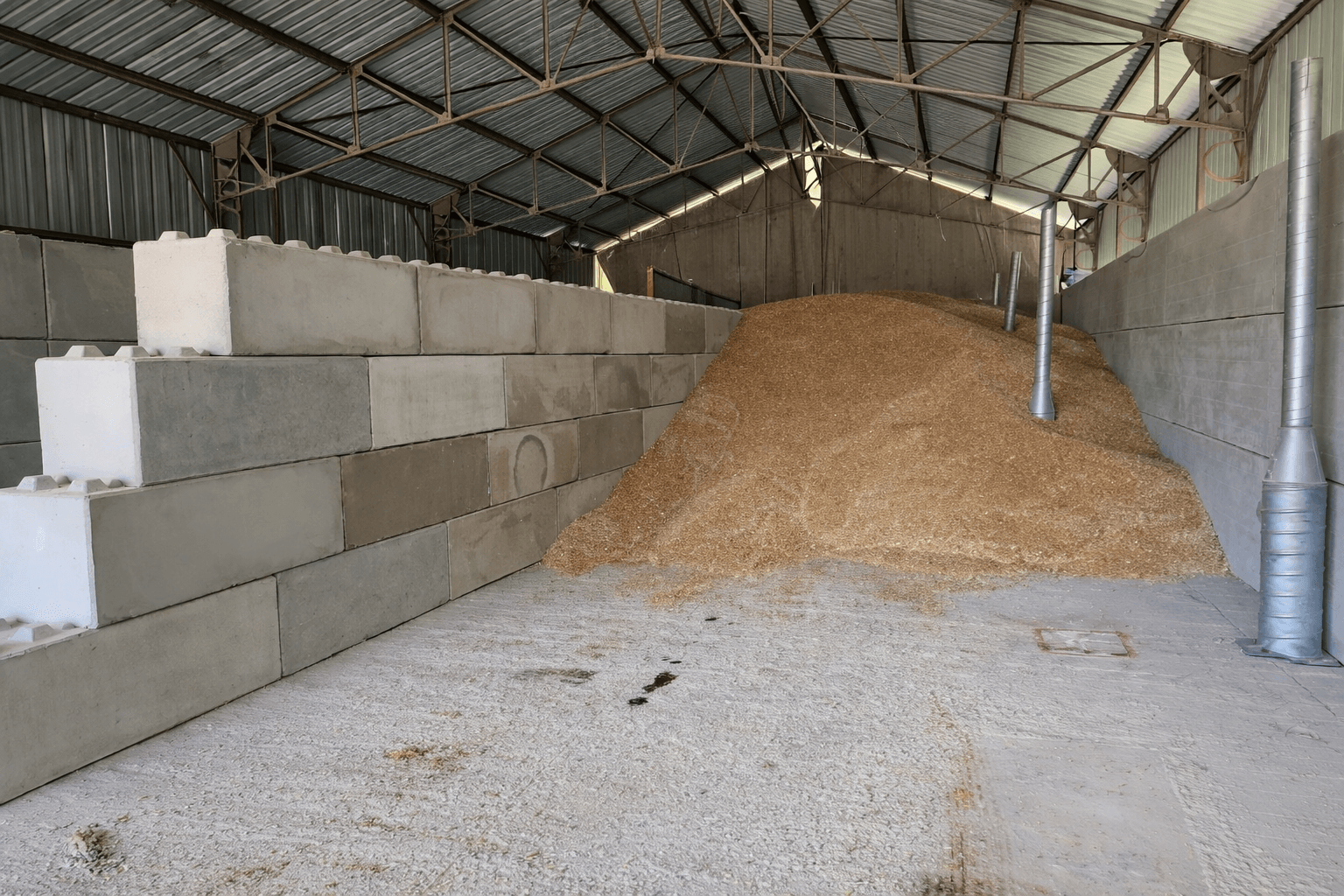 exemple réalisation murs béton empilables lego stockage